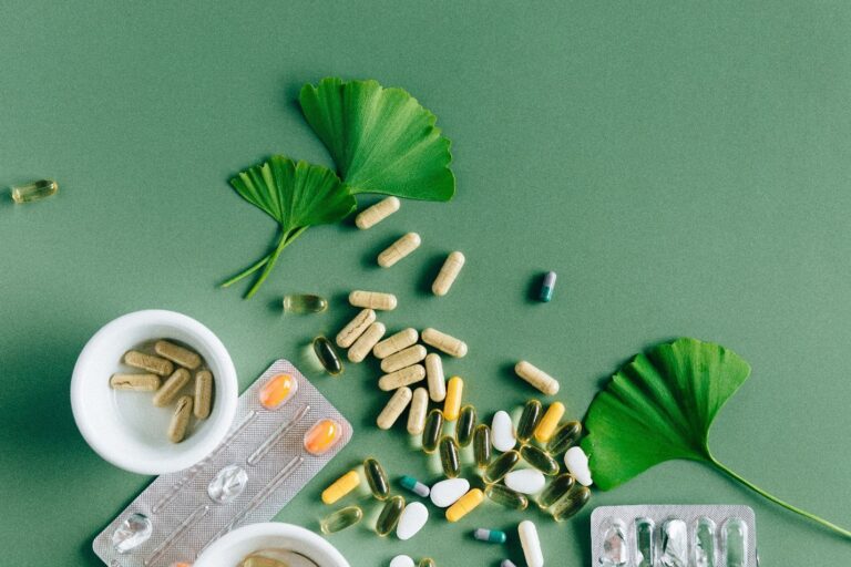 an assortment of dietary supplements with leaves